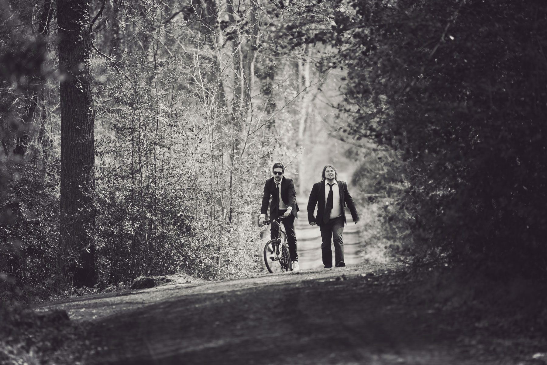 riding a bike through the woods