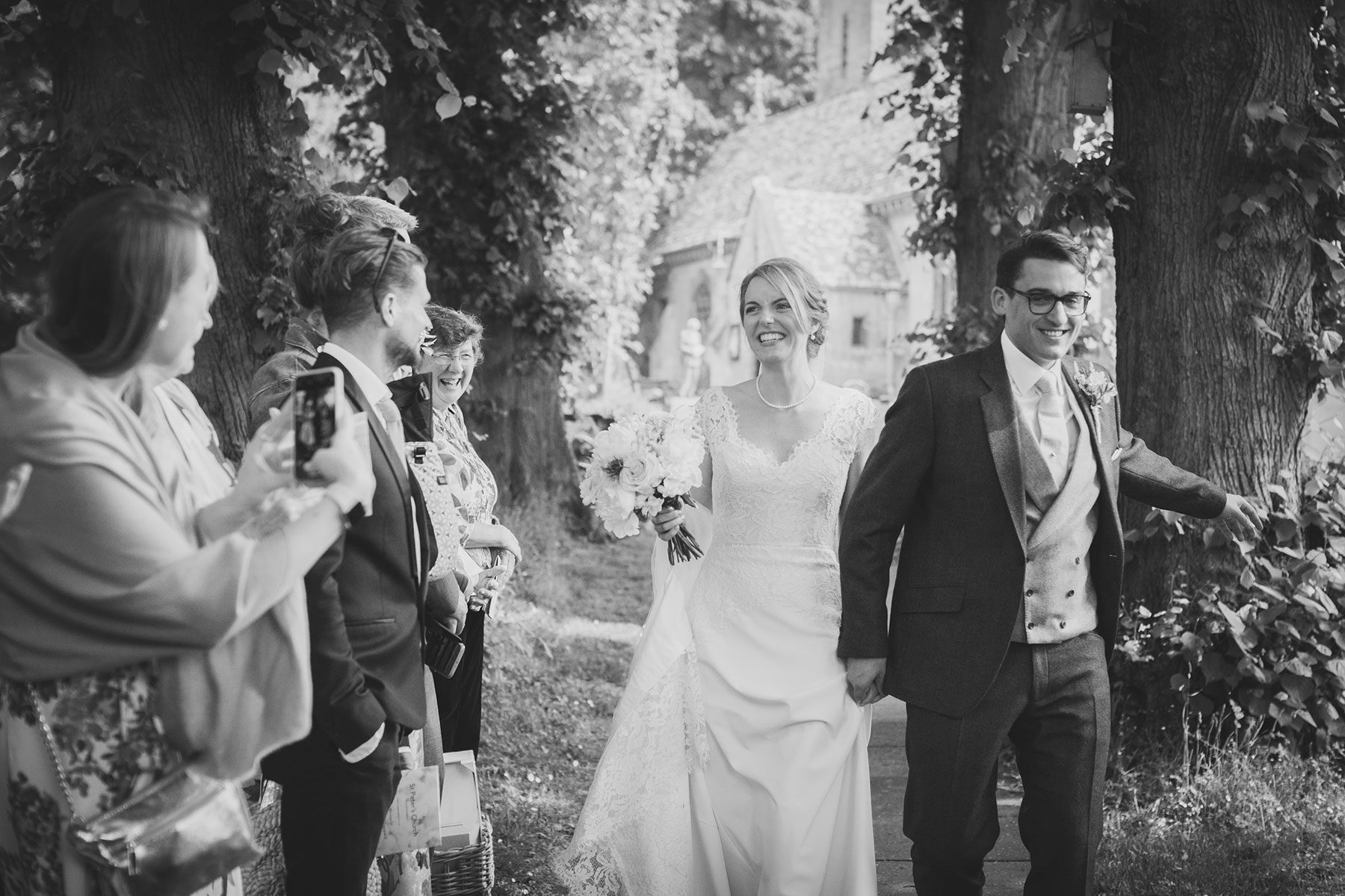 Leaving the church - Reportage Wedding Photography in Cheltenham, Gloucestershire & the Cotswolds | Bullit Photography.