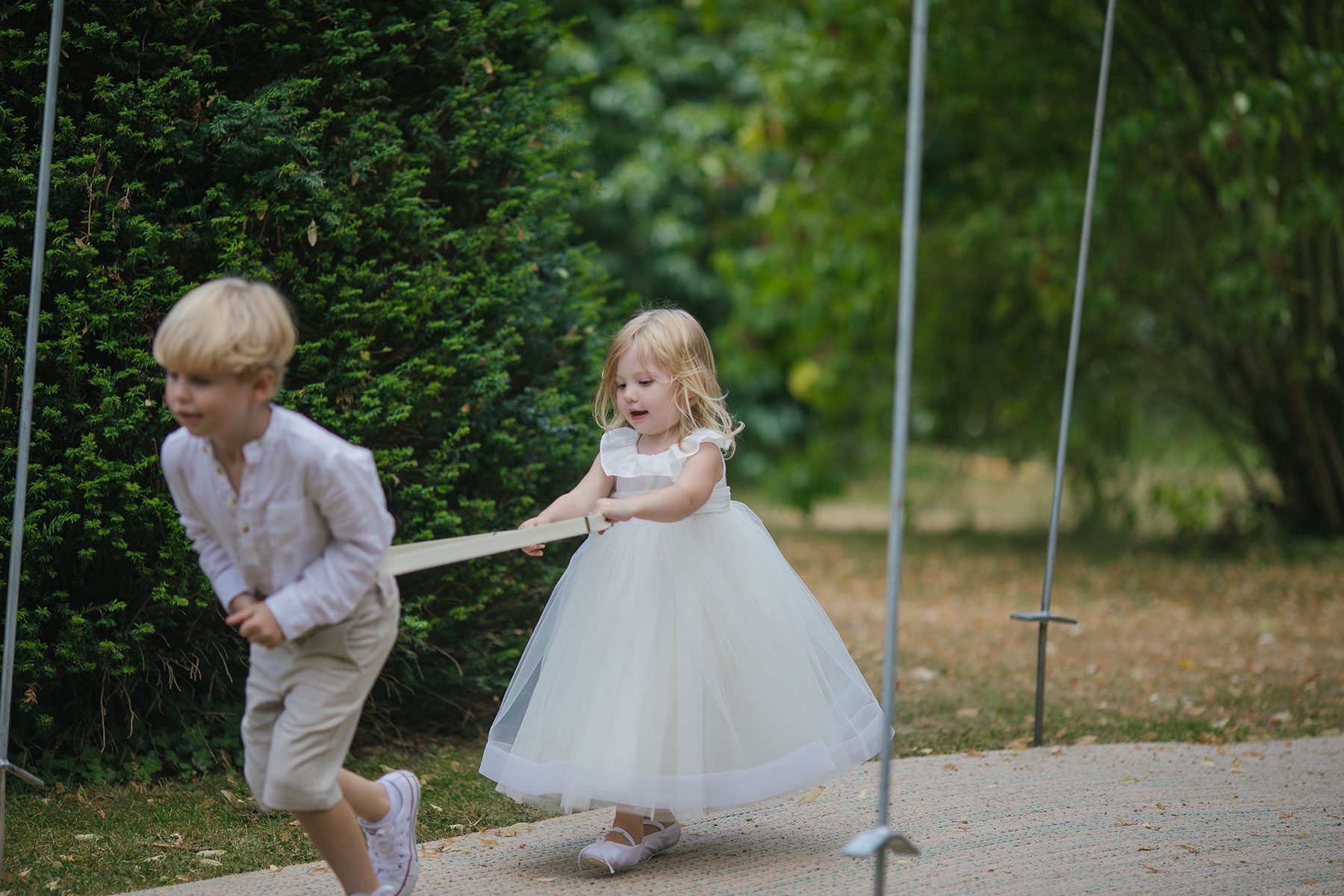 children playing at a wedding