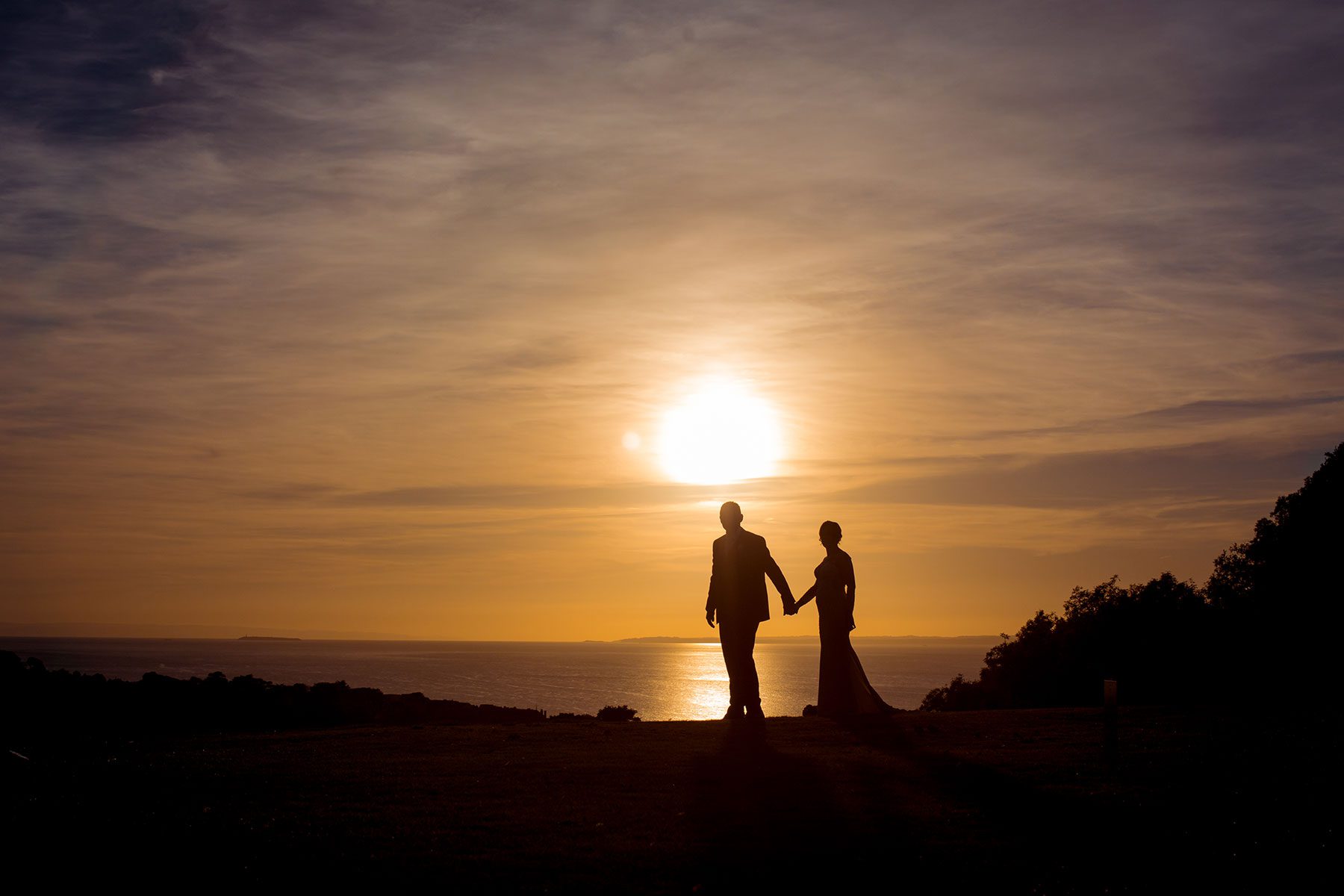 couple walking in the sun